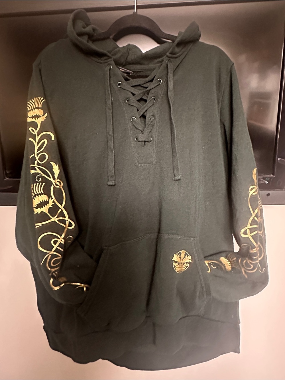 Torrid Dark Green Lace-Up Hoodie Sweater with Gold Floral Sleeve Details